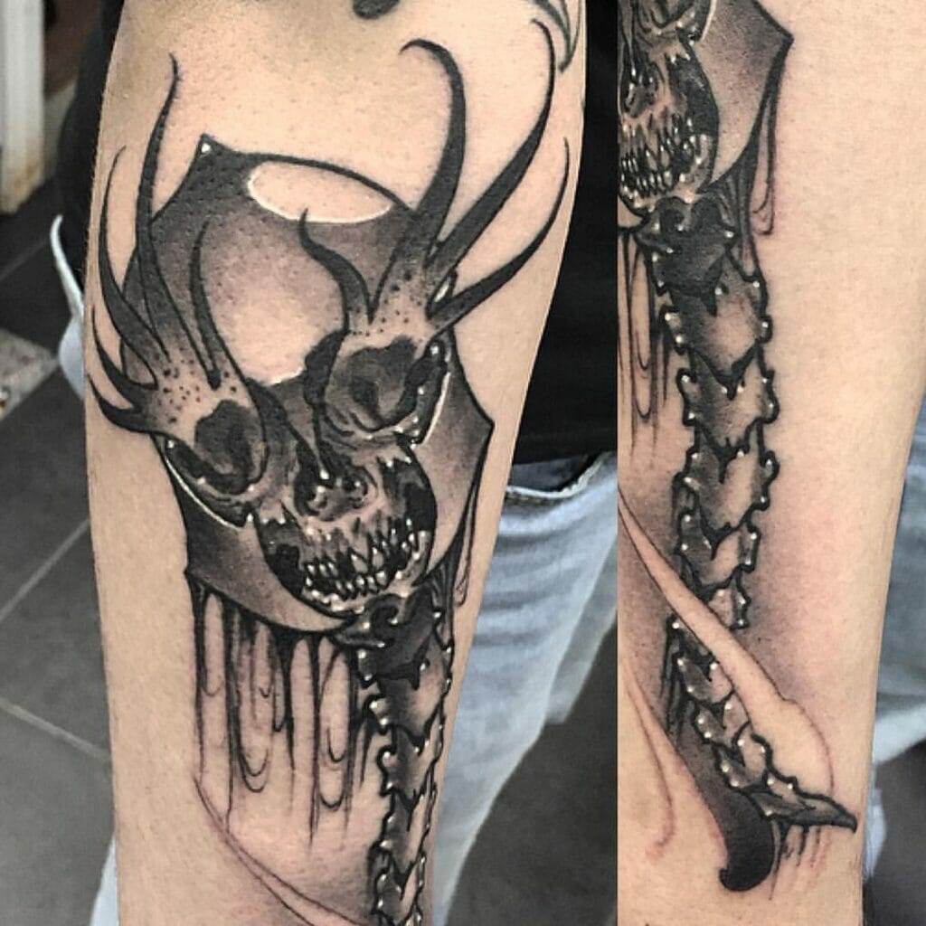 A black and grey skull tattoo on the forearm showcased in Katy's portfolio.