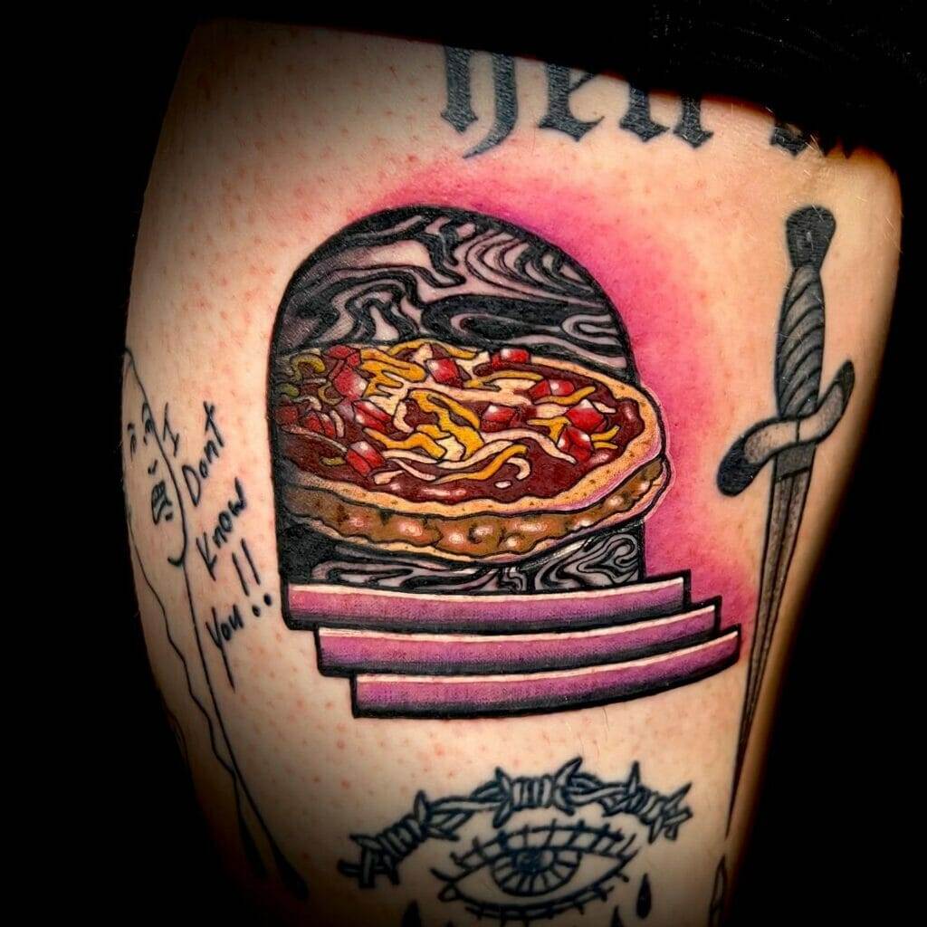 Tattoo, pizza, thigh.