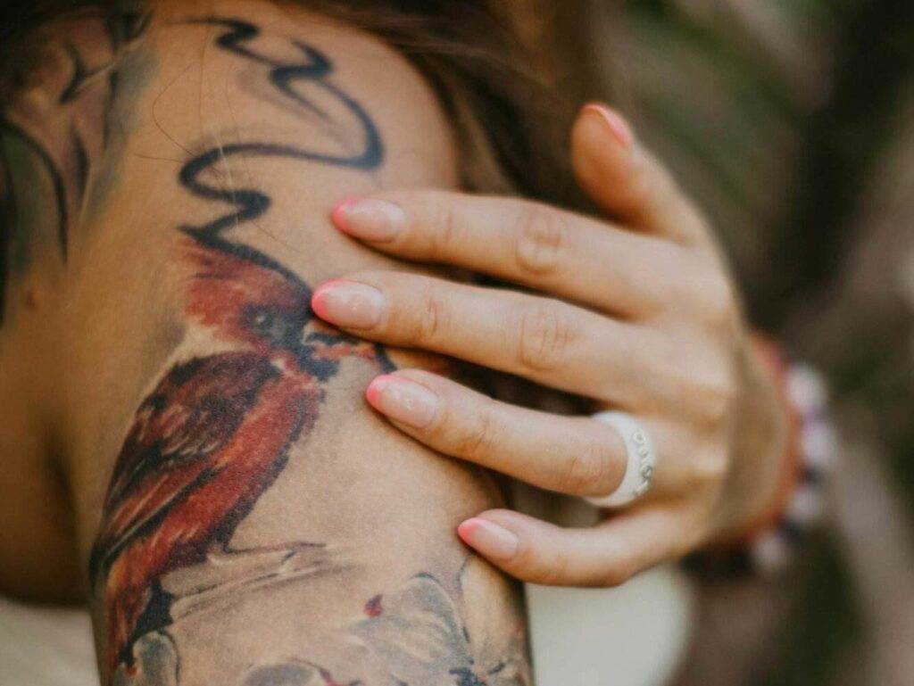 Close Up Shot of Human Arm with Tattoos